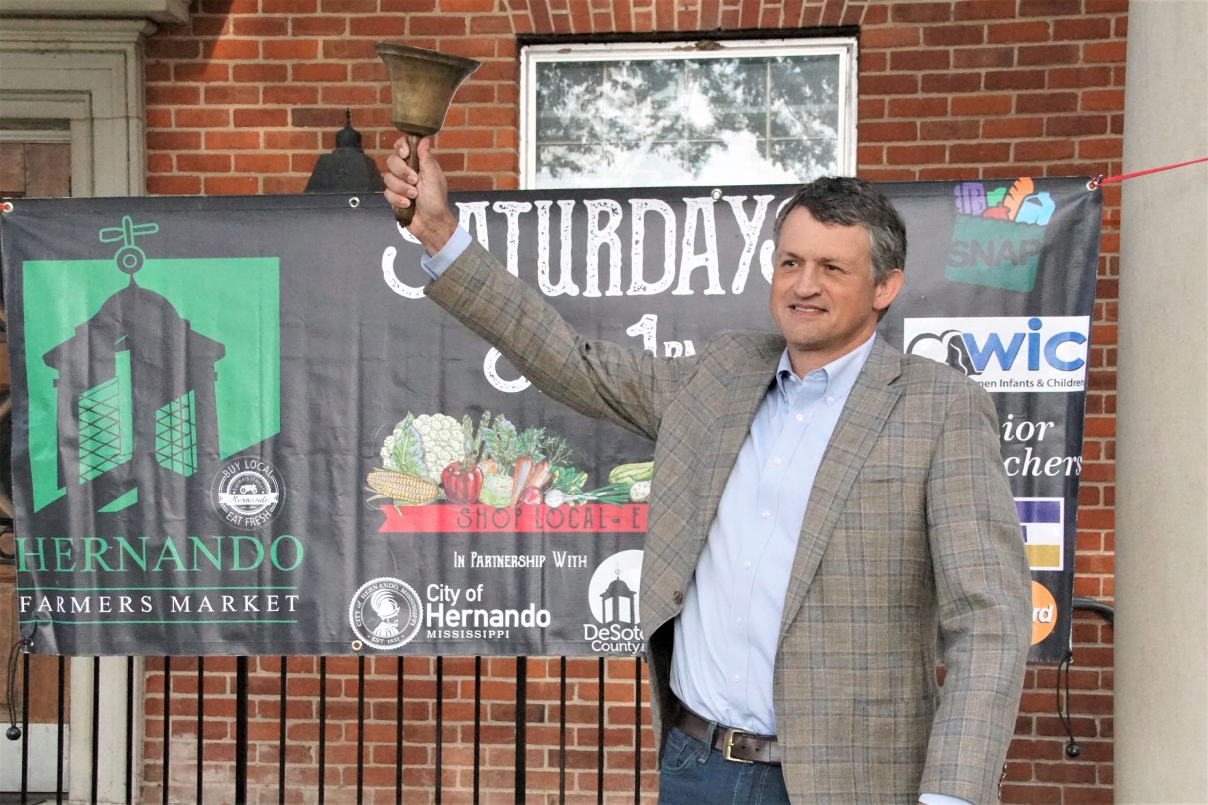 Coleman rings Farmers Market bell